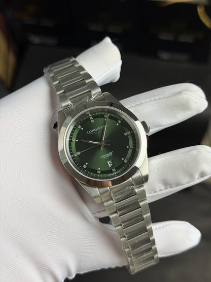 Silver with Green Dial.