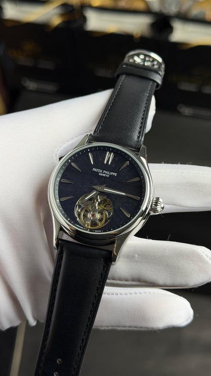 Silver with Blue Marble Dial.