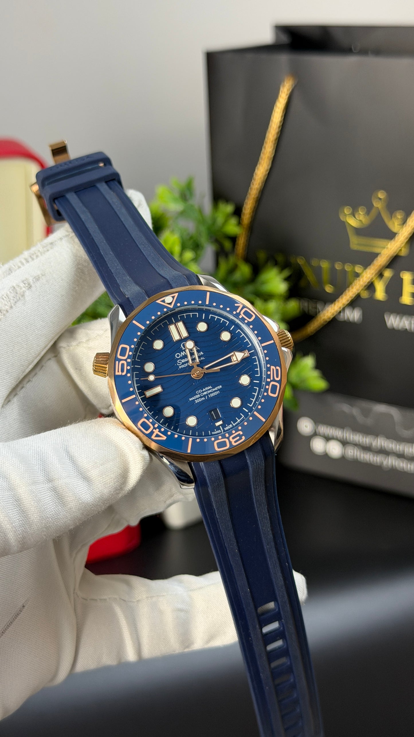 Rose Gold with Blue Dial.