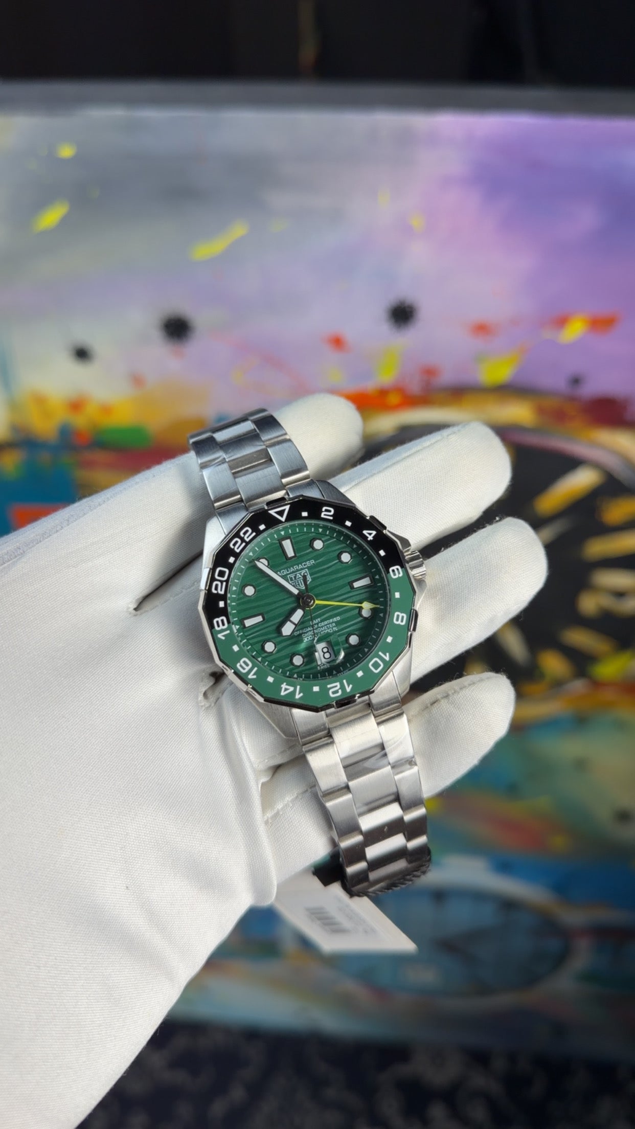 Silver with green dial