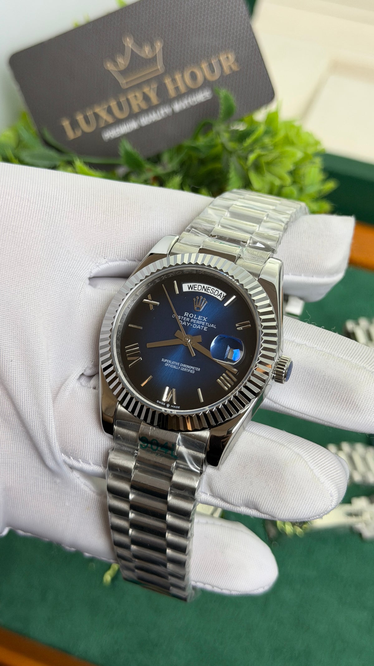 Silver with Blue Dial.