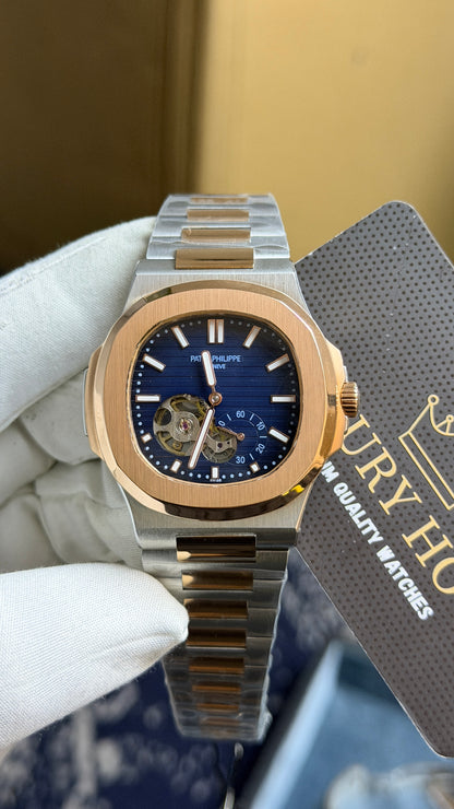 Rose Gold Two Tone with blue dial.