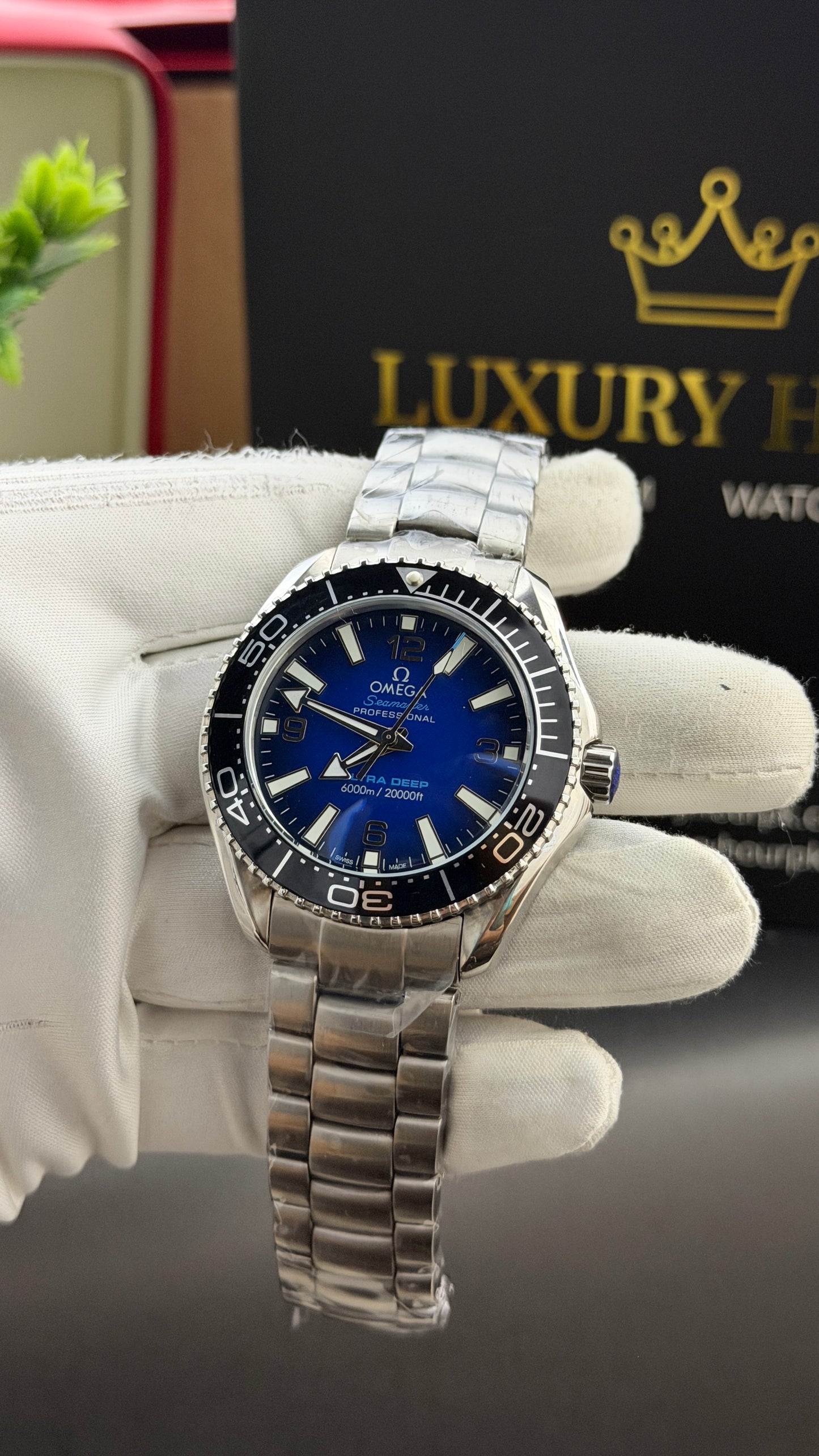 Silver with Blue Dial.