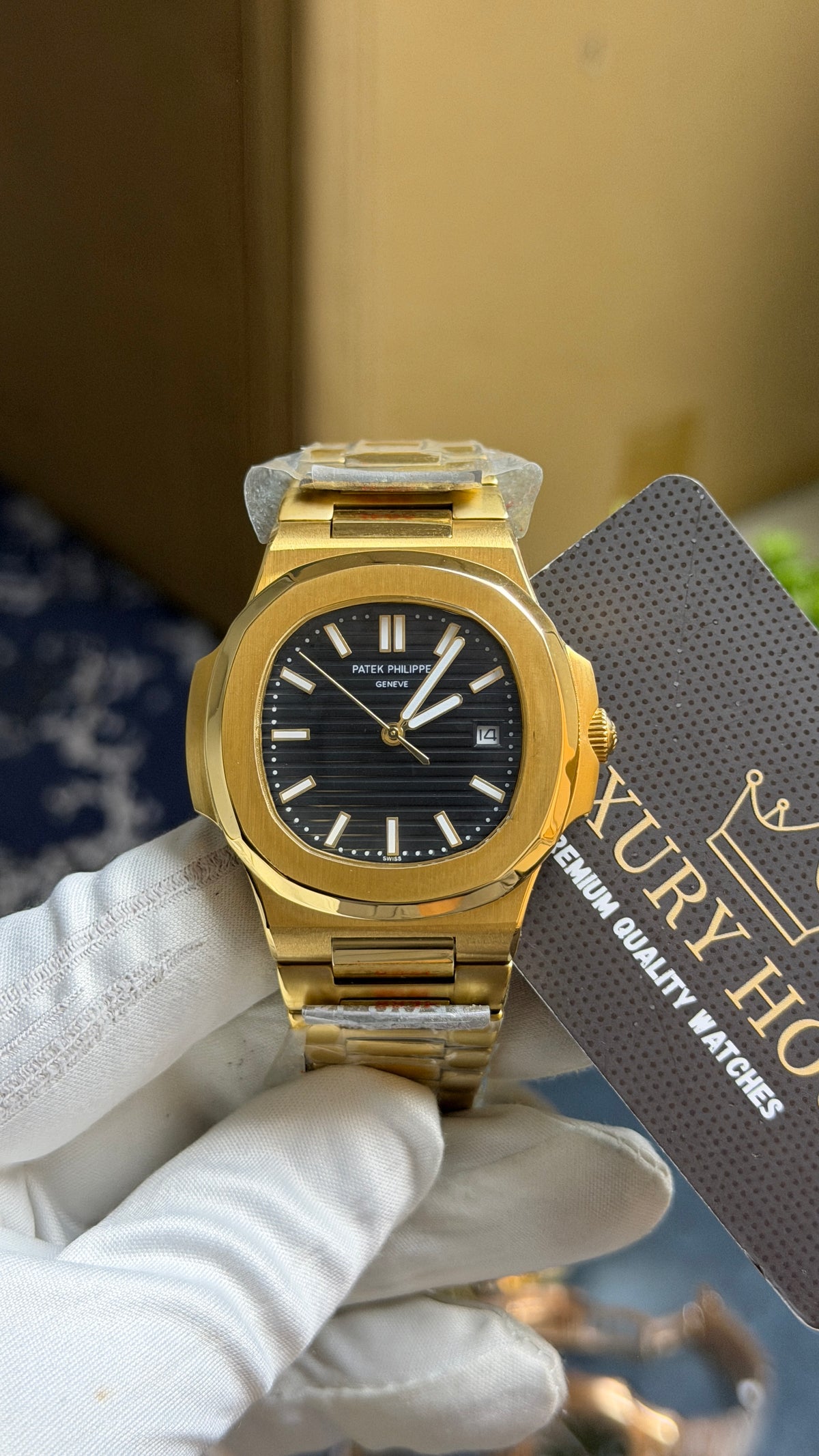 Yellow Gold with Black Dial.