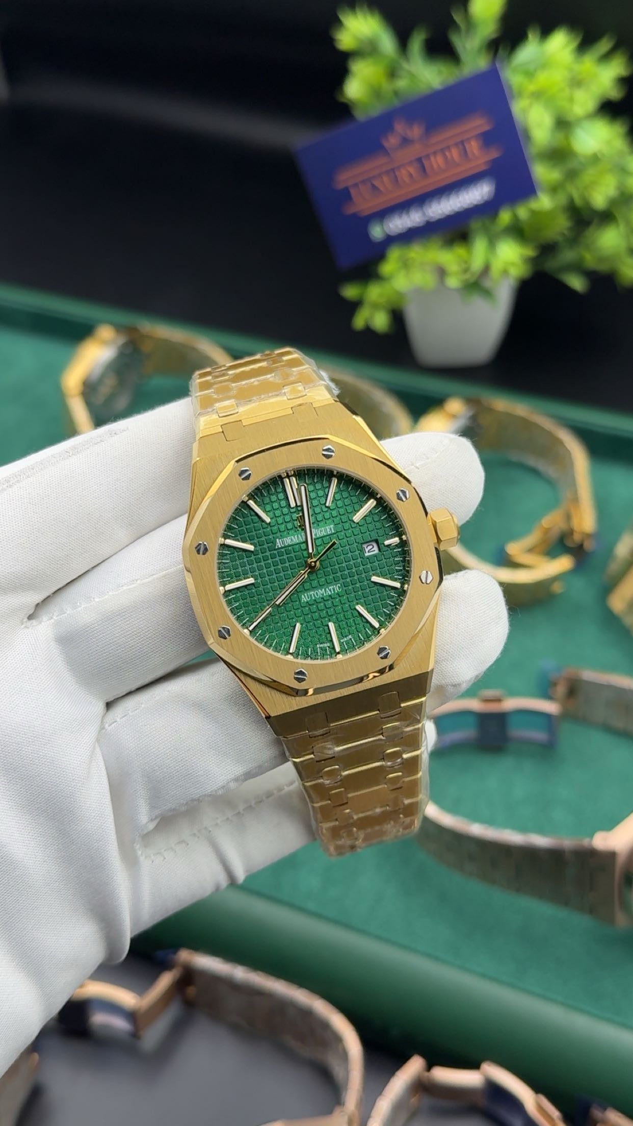 Yellow gold with green dial