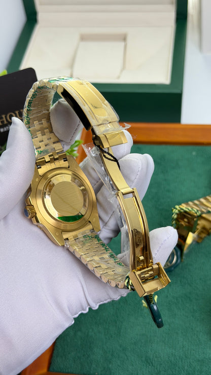 Yellow Gold with Black Dial.