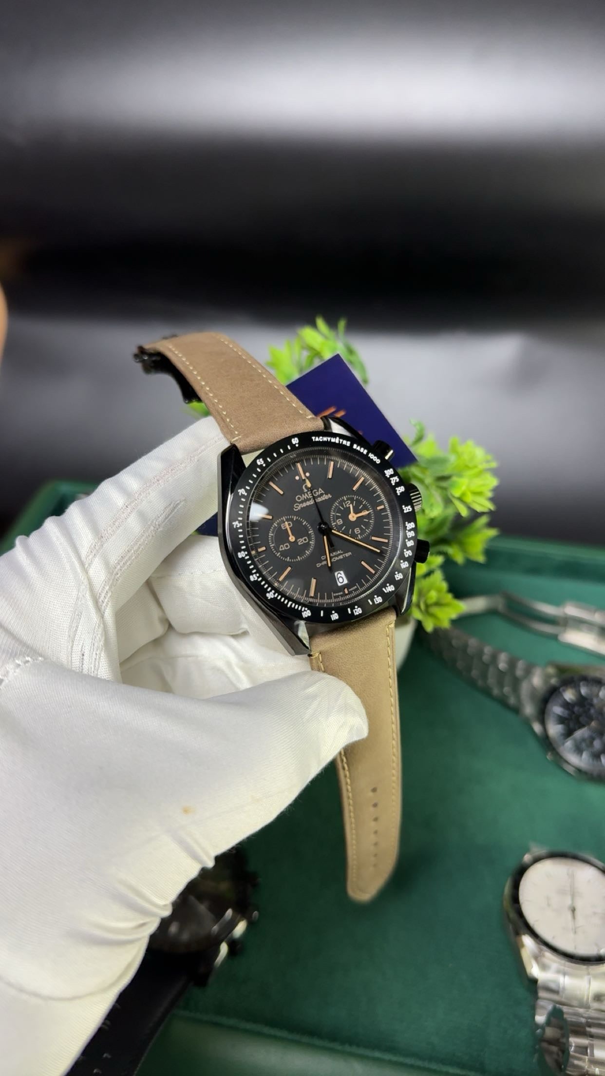 Black dial with brown strap