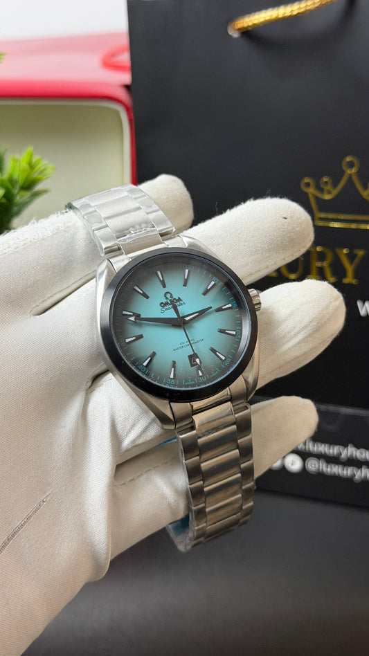 Silver with Blue Dial.