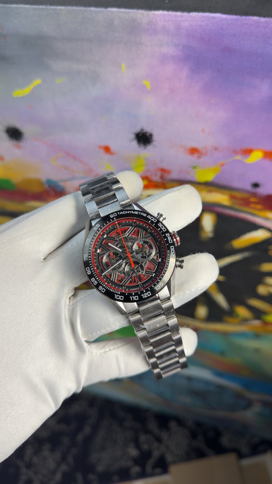 Silver with red dial