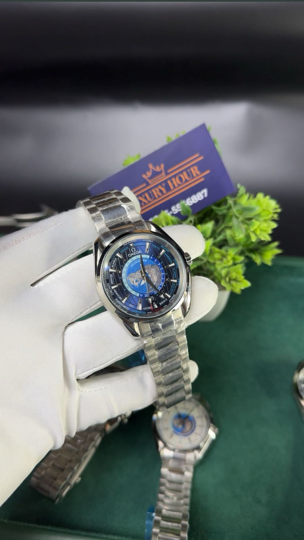 Silver with blue dial