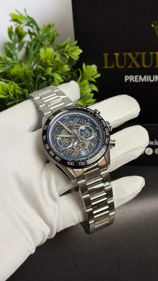 Silver with Blue Dial.