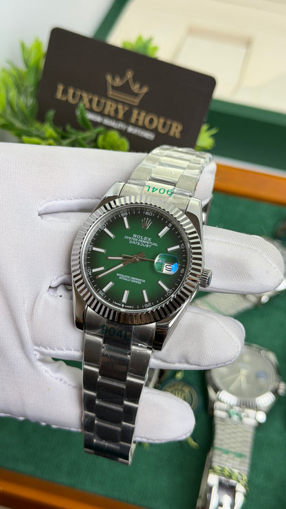 Silver with Green Dial.