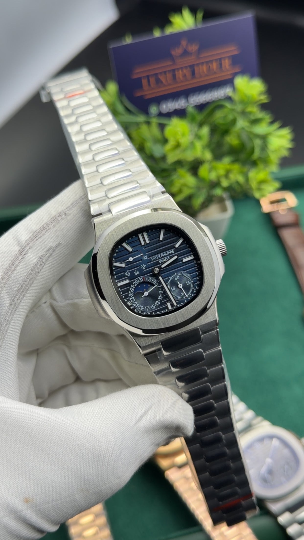 Silver with blue dial