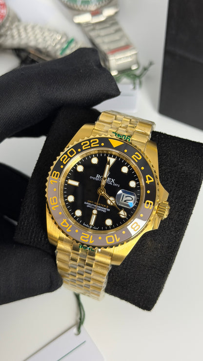 Yellow Gold With Black Dial.