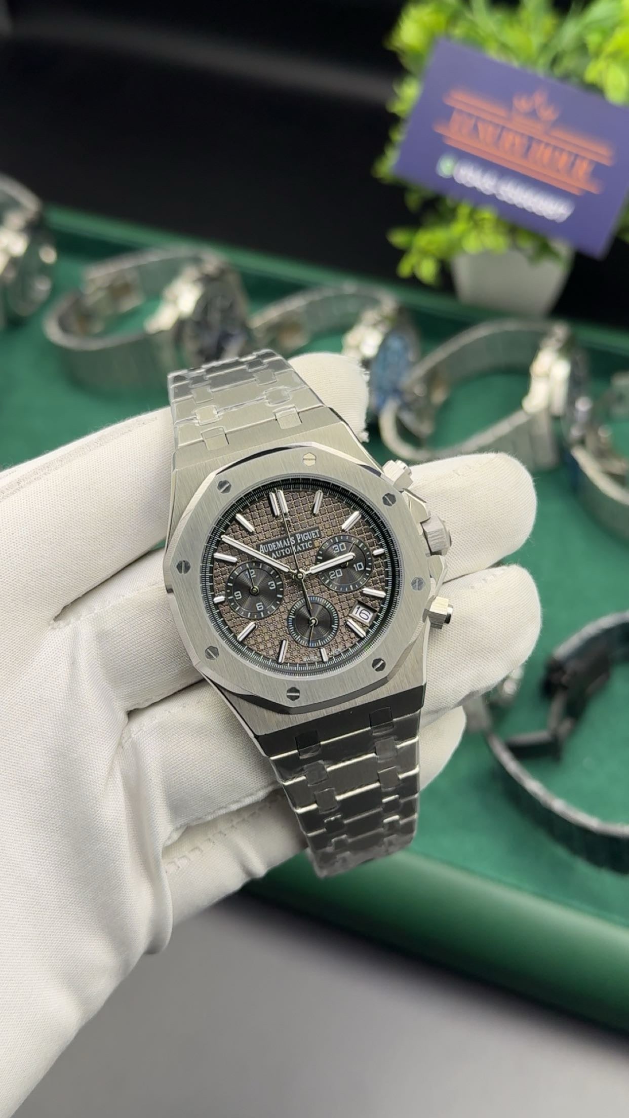 Silver with grey dial