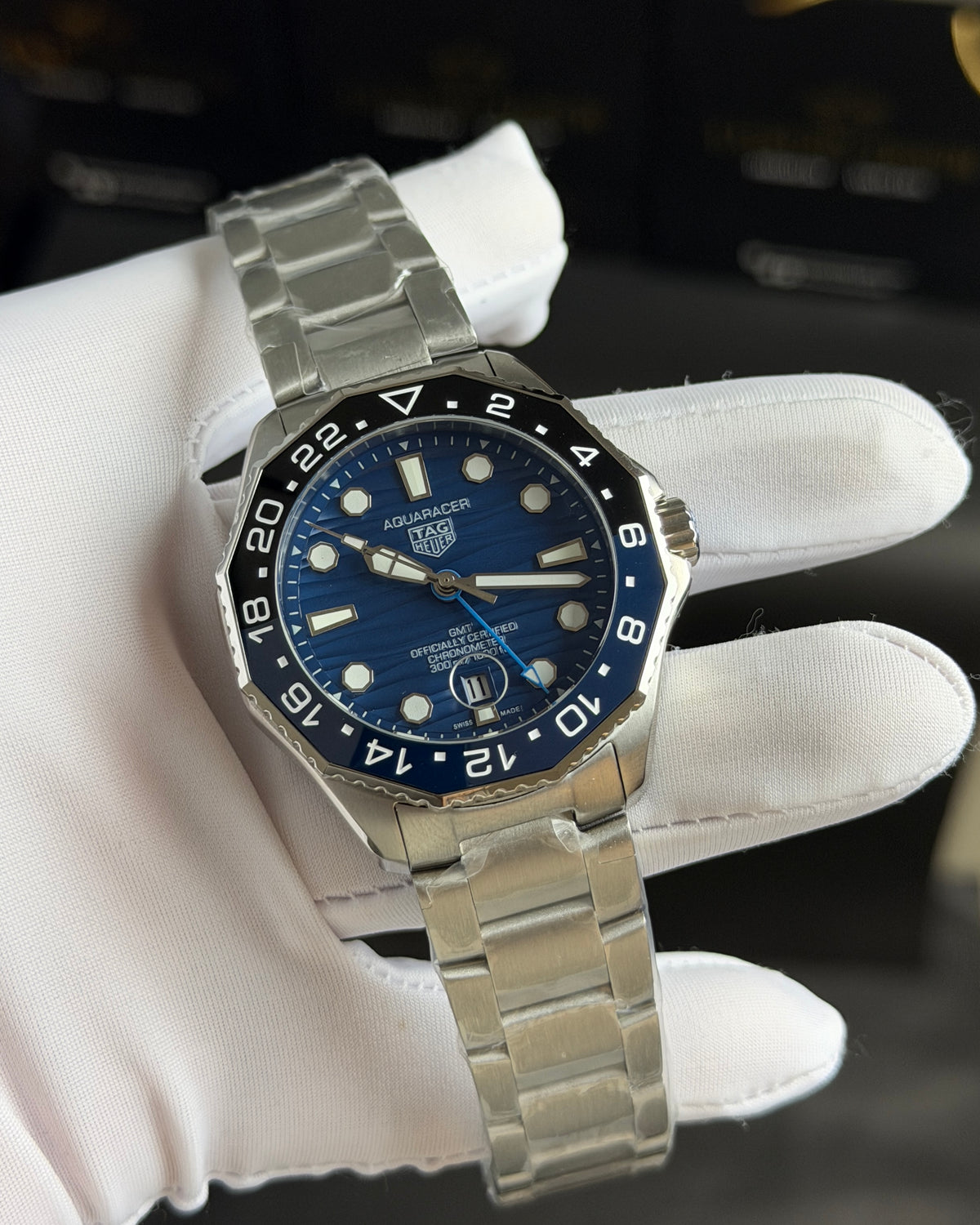Silver with Blue Dial.