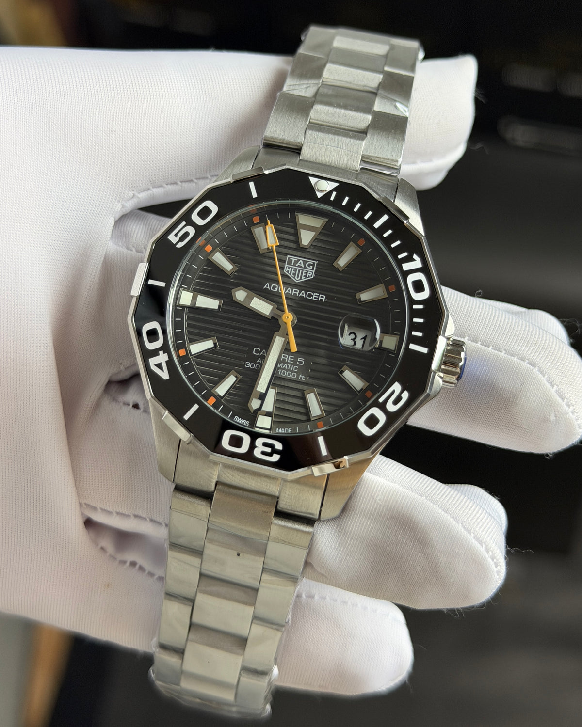 Silver with Grey Dial.
