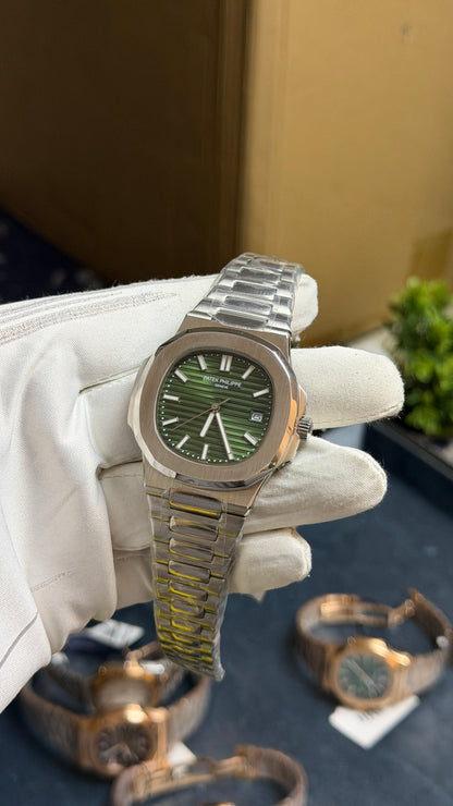 Silver with Green Dial.