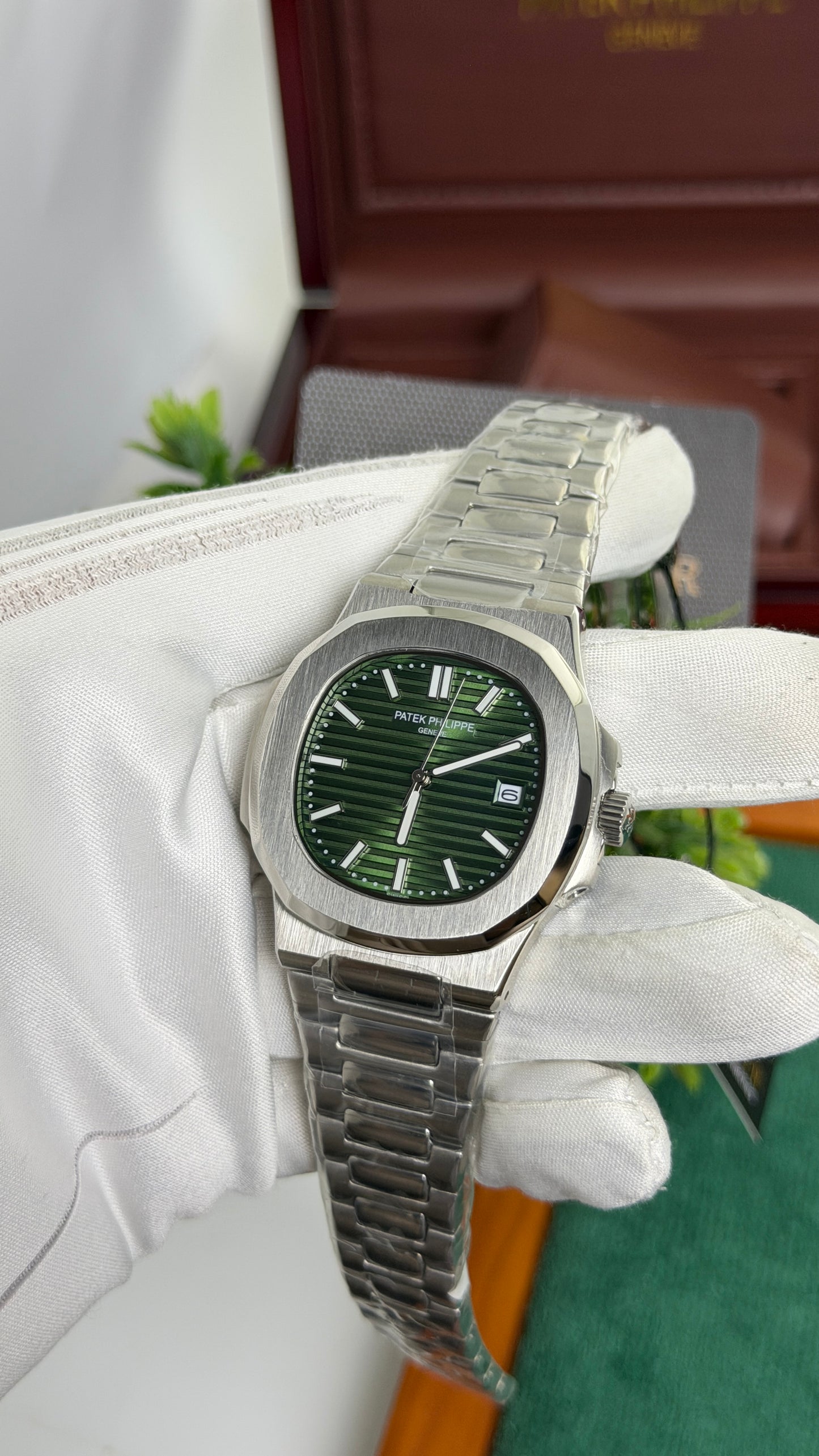 Silver with Green Dial.