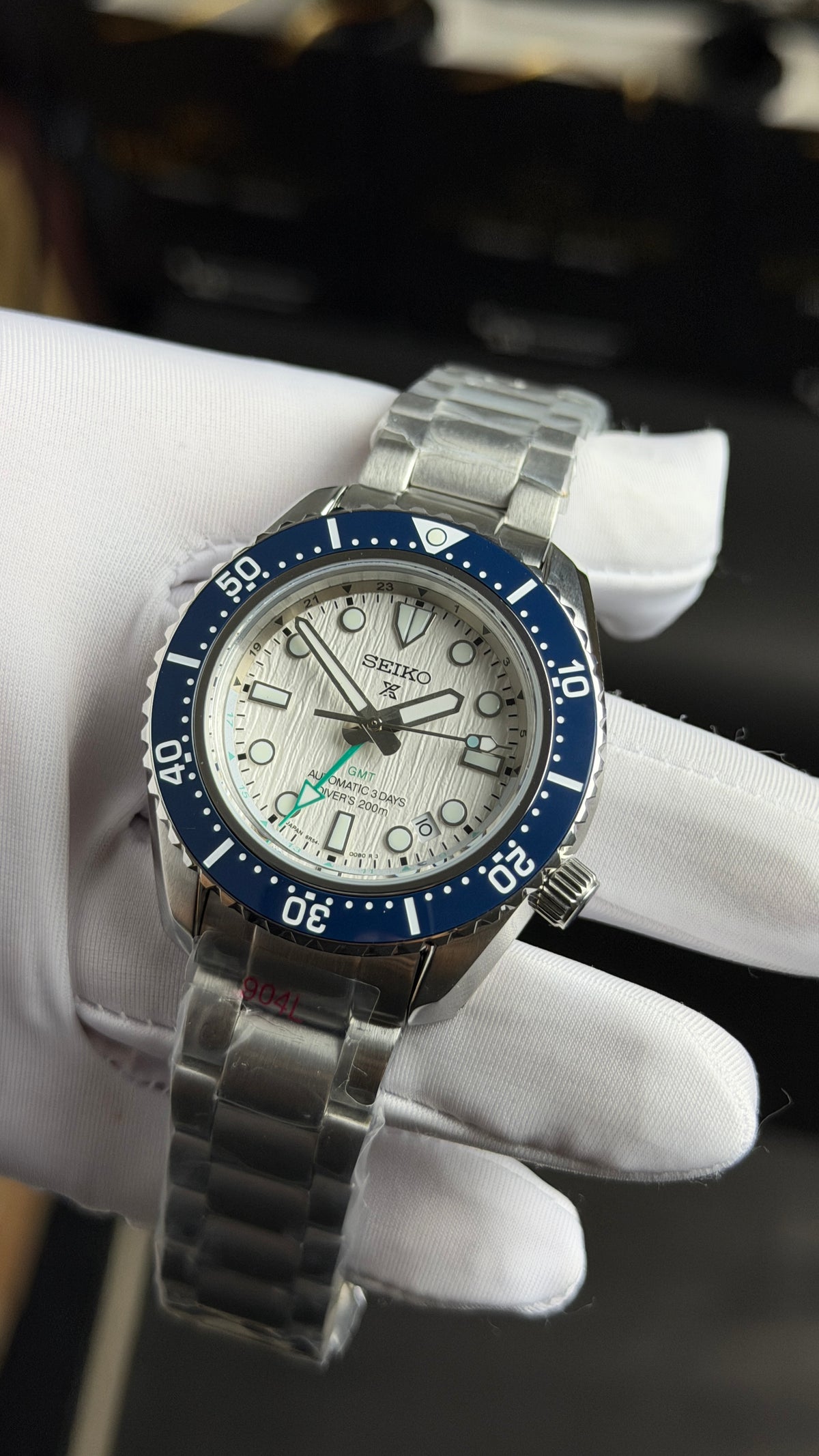 Silver with White Dial.