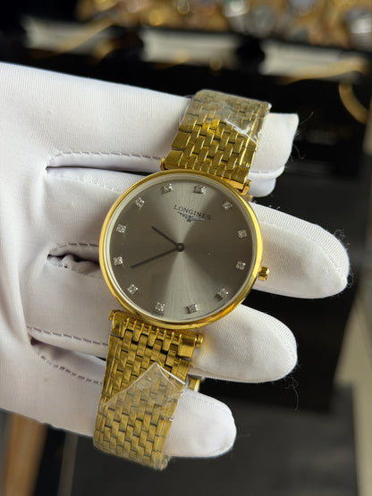 Yellow Gold with Grey Dial.