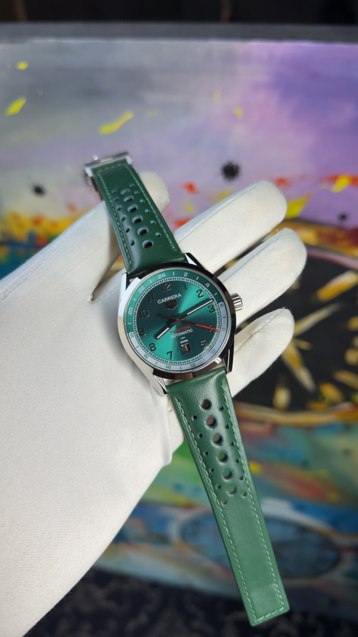 Silver with green dial