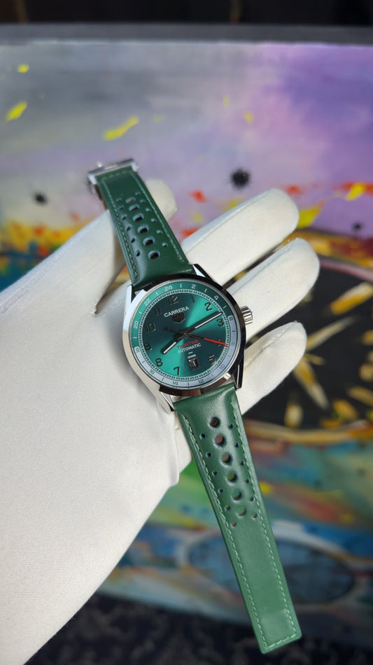 Silver with green dial