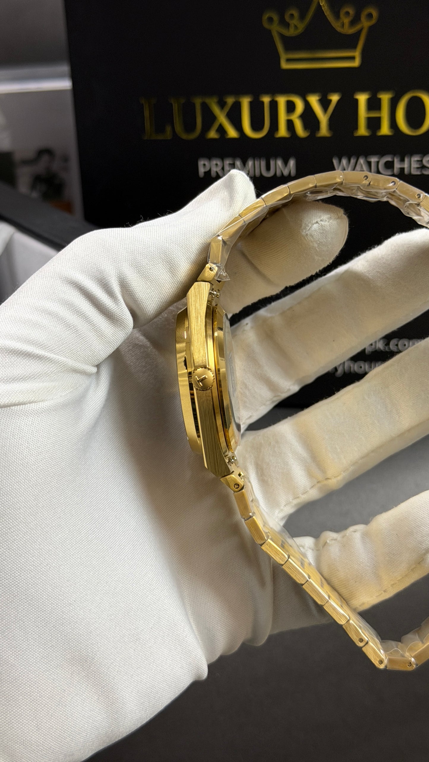 Yellow Gold with Black Dial.