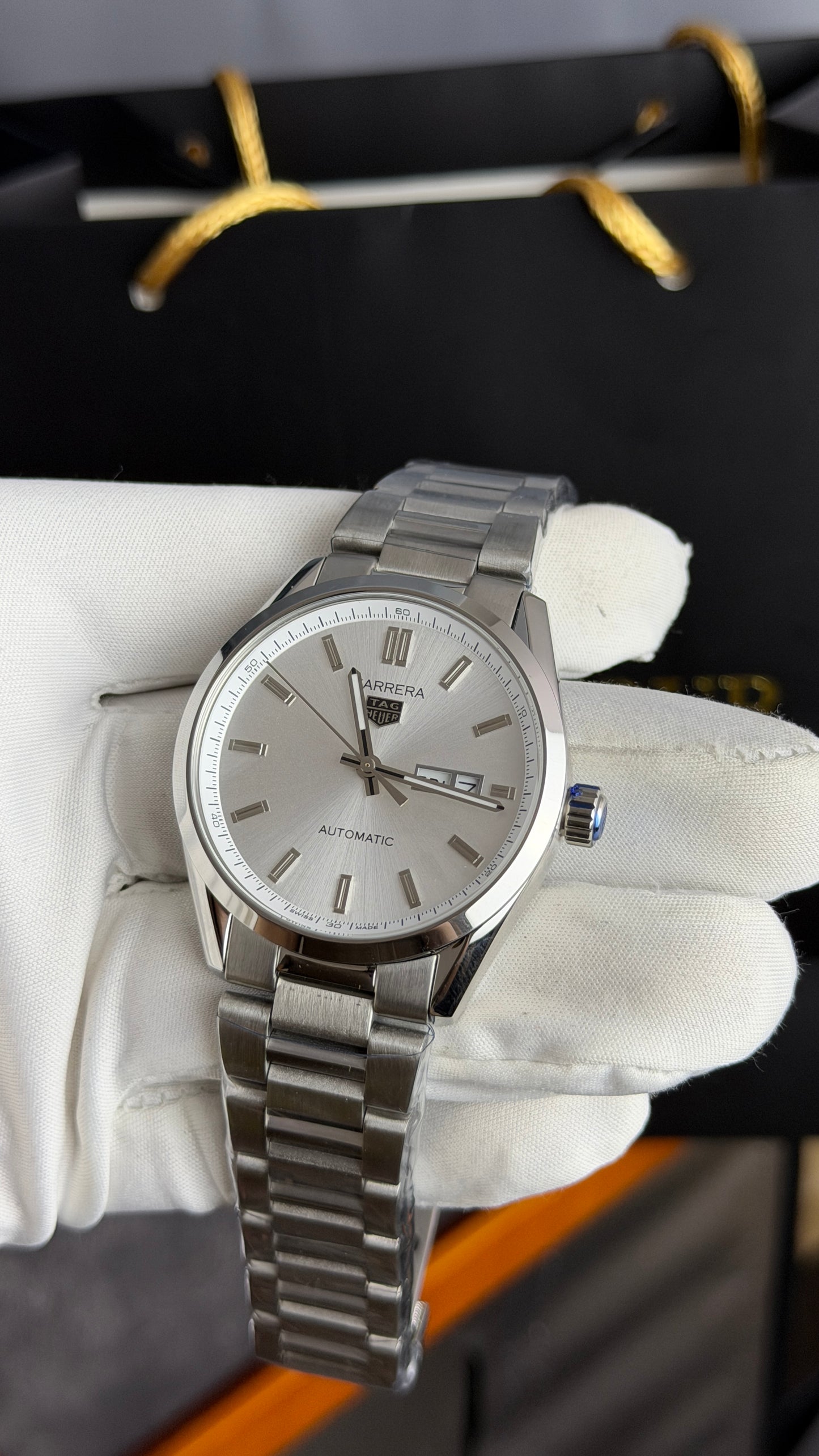 Silver with White Dial.
