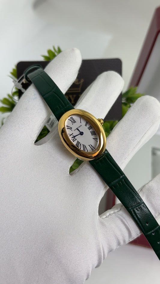 Yellow Gold with Green Strap.