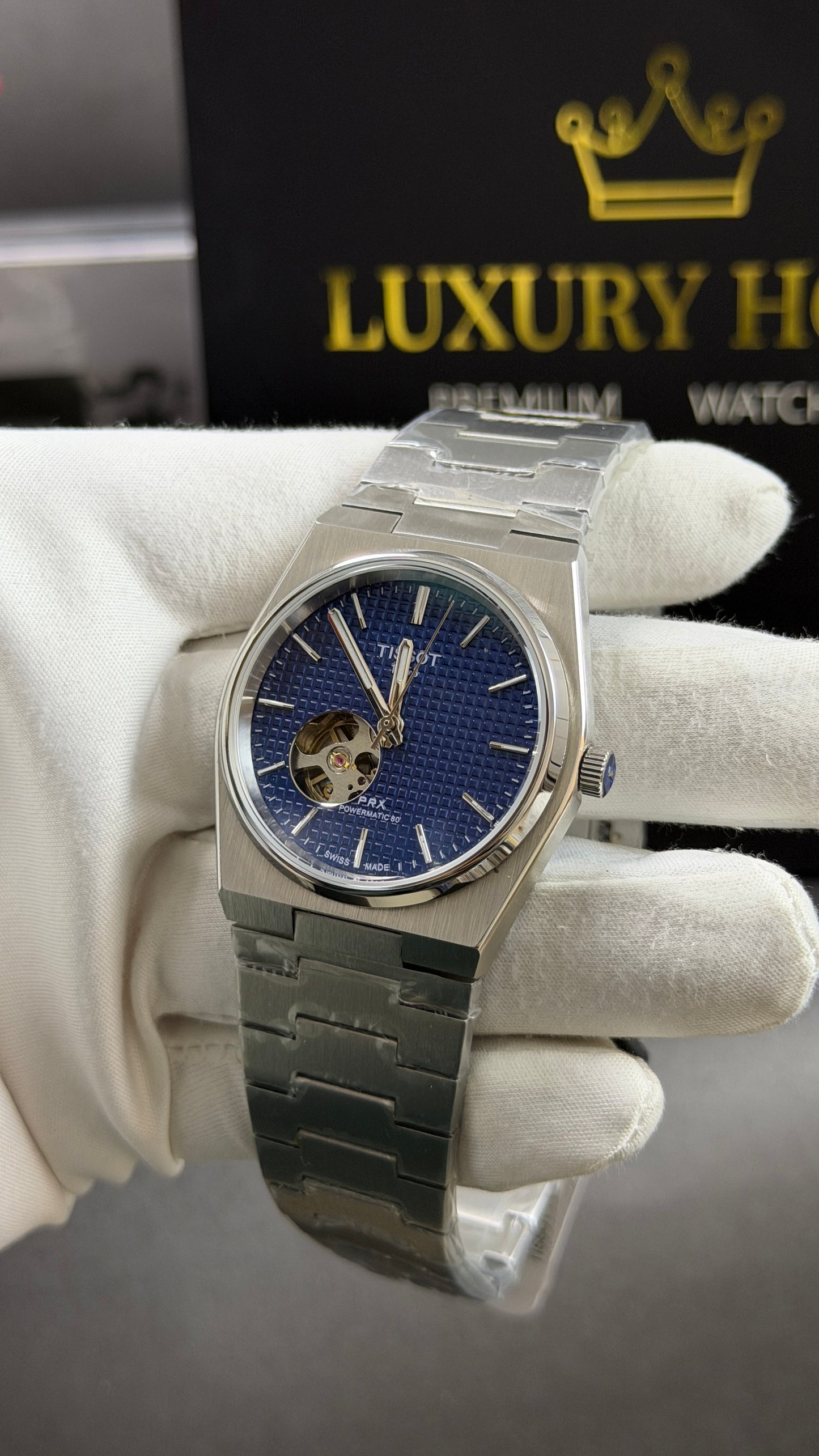 Silver with Blue Dial.