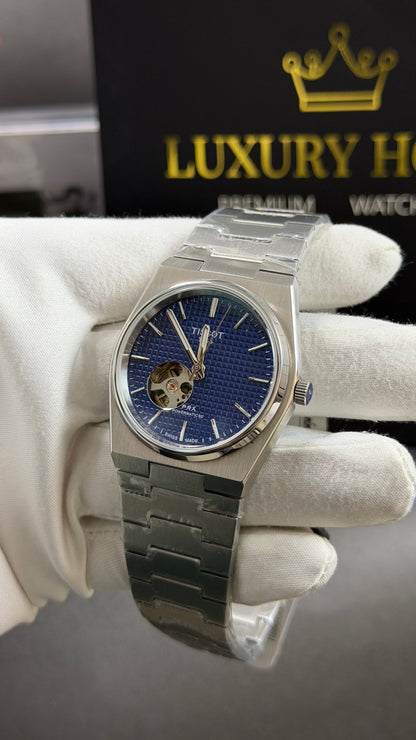 Silver with Blue Dial.