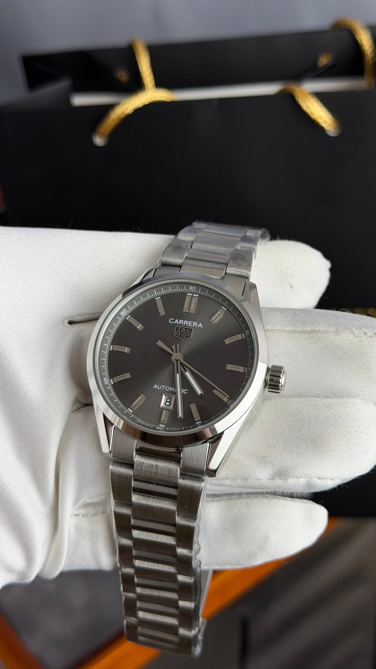 Silver with Grey Dial.