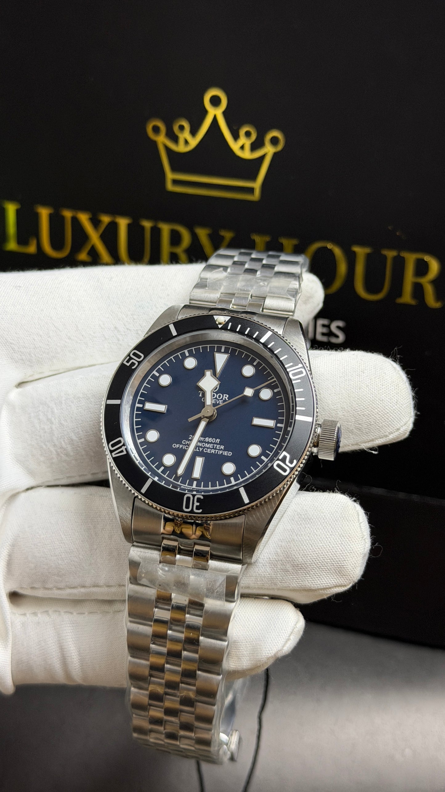 Silver with Blue Dial.