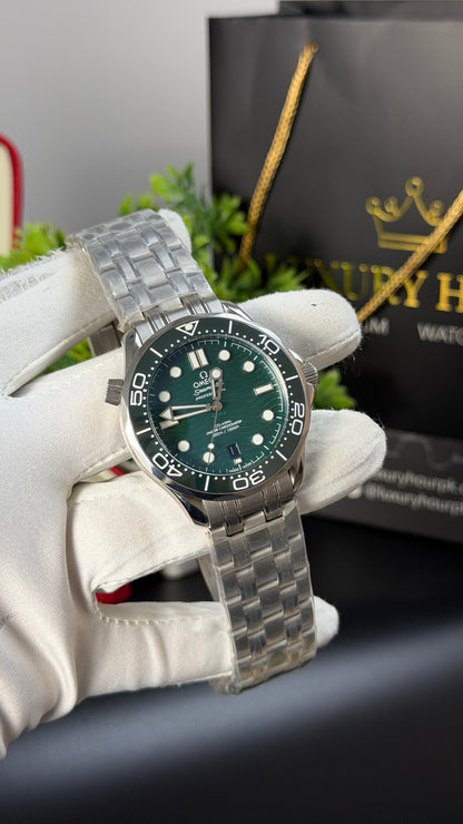 Silver with Green Dial.