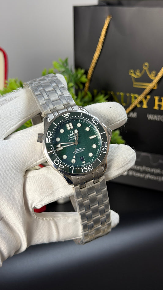 Silver with Green Dial.