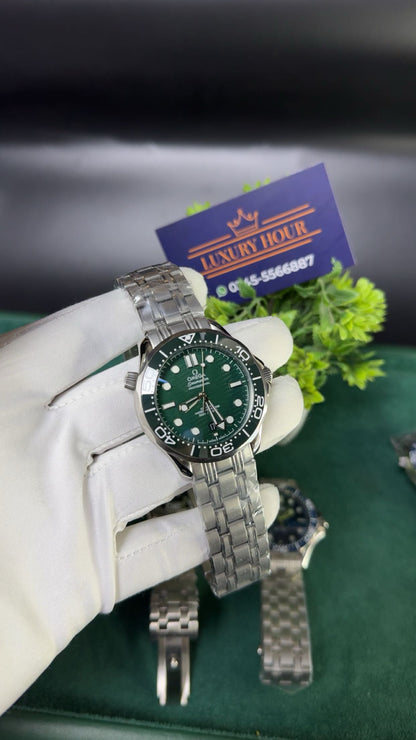 Silver with green dial