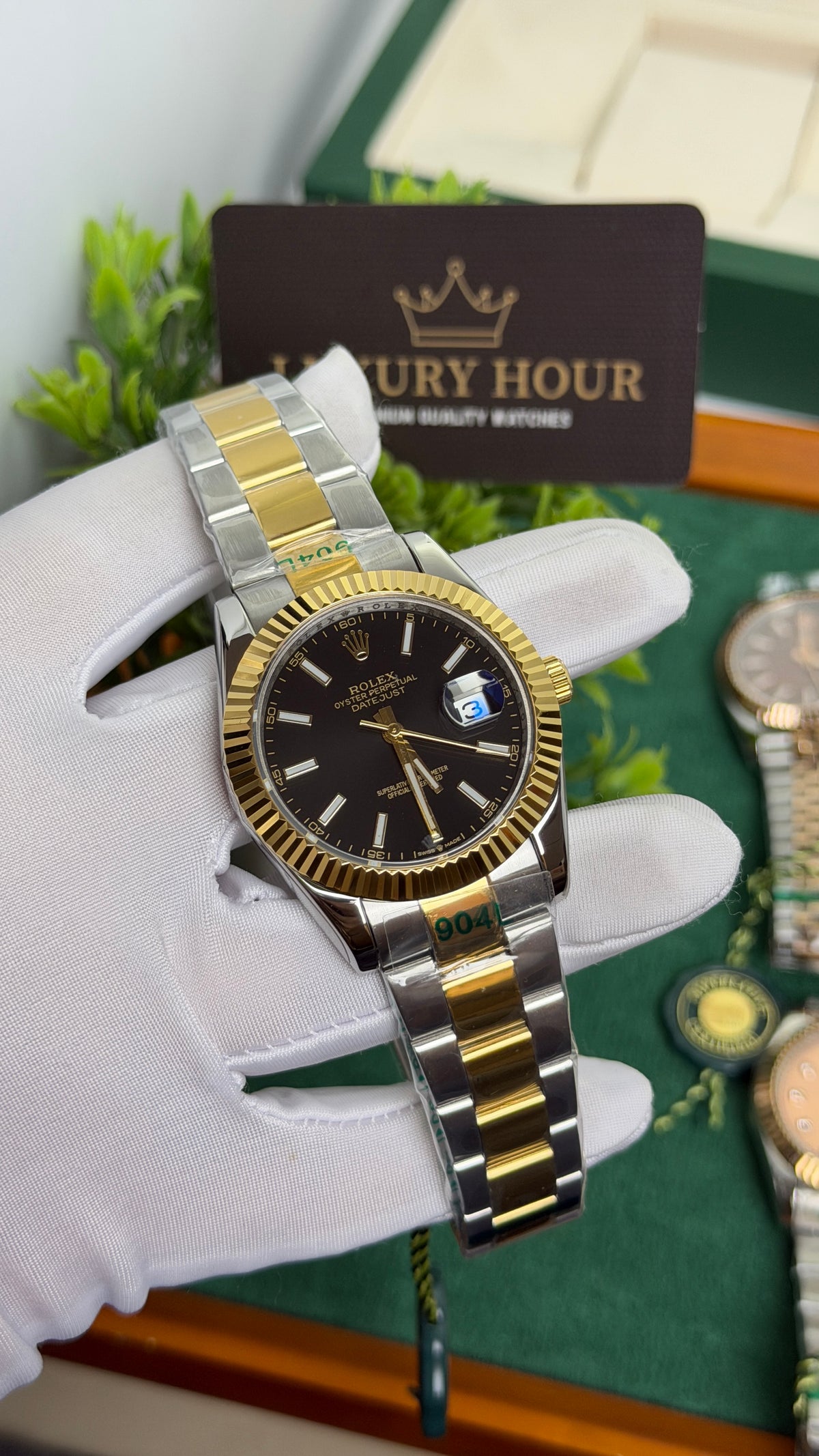 Yellow Gold Two Tone with Black Dial.