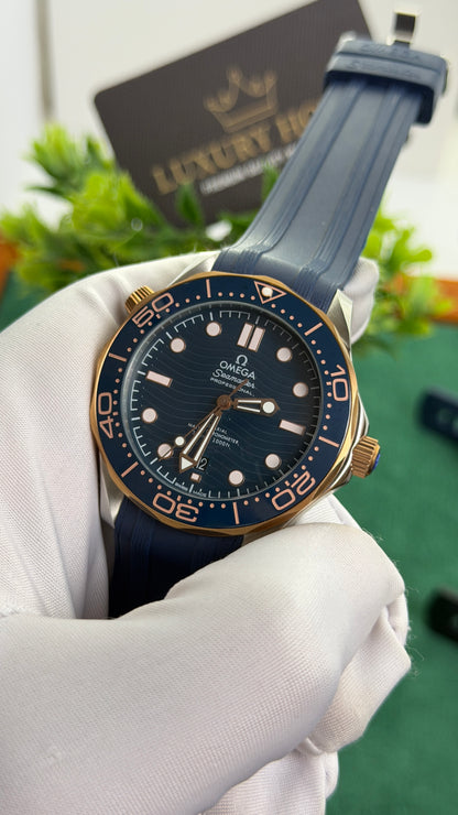 Rose Gold with Blue Dial.