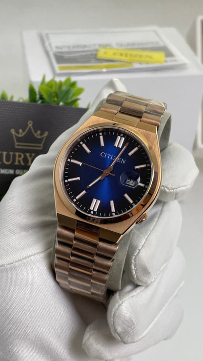 Rose Gold with Aqua Dial.