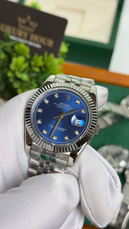 Silver with Blue Dial.