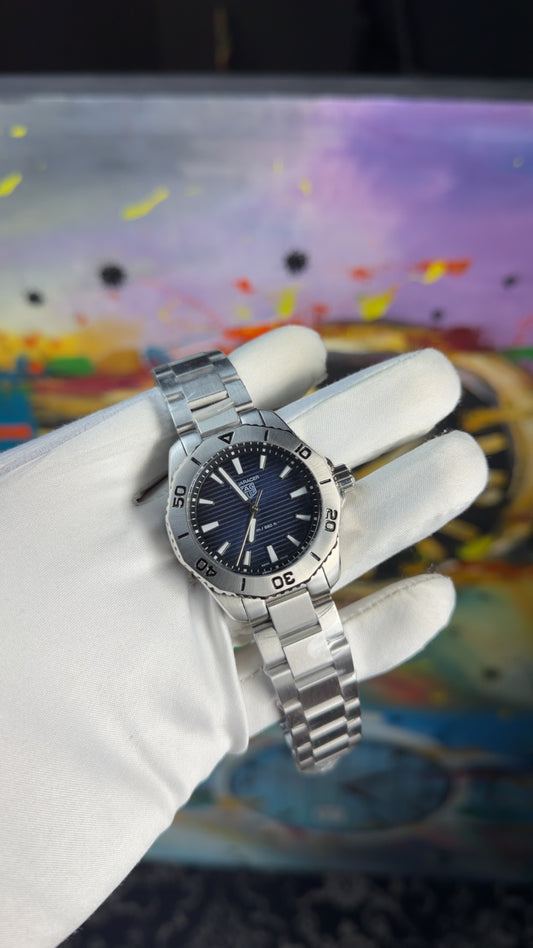 Silver with blue dial