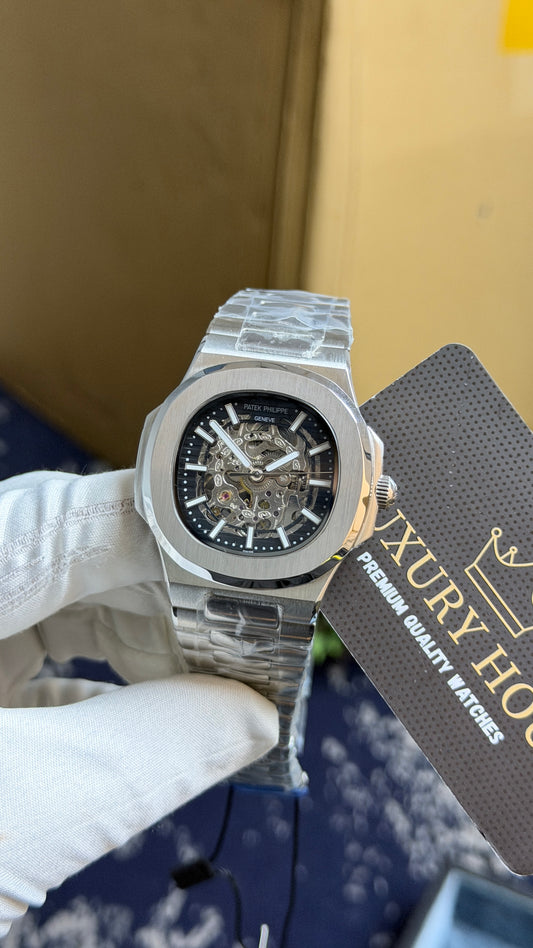 Silver with Skeleton Dial.