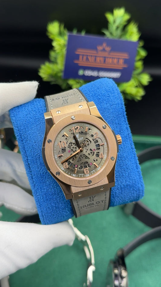 Rose gold with grey dial