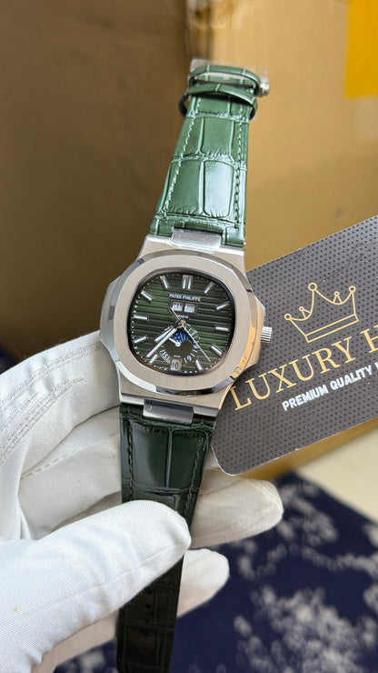 Silver with Green Dial.