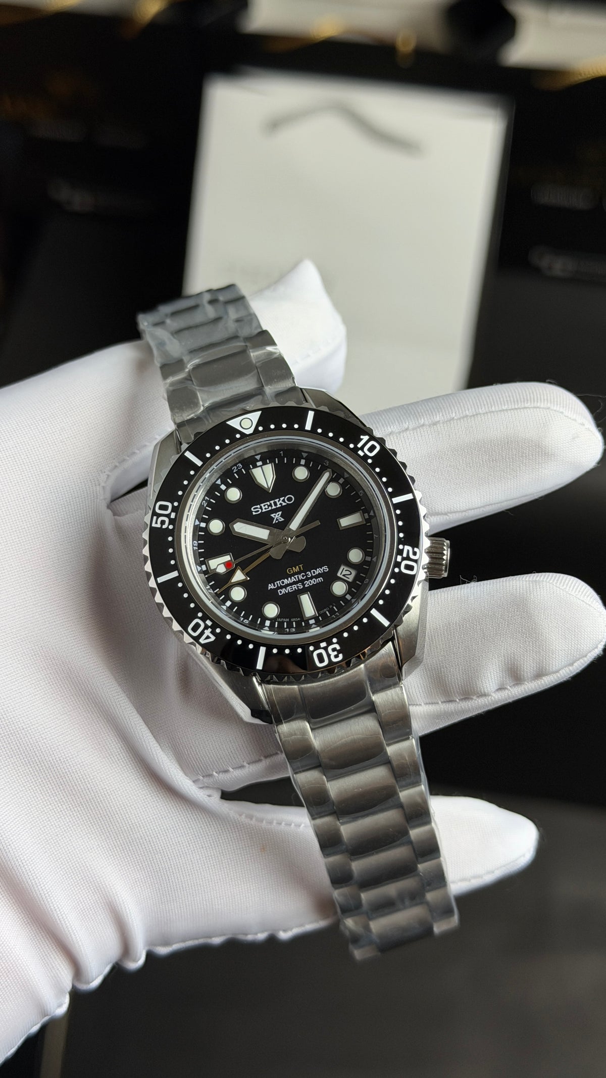 Silver with Black Dial.