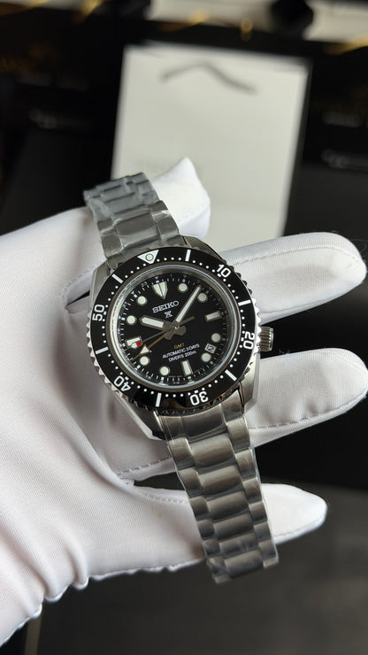 Silver with Black Dial.