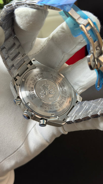 Silver with Green Dial.
