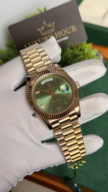 Rose Gold with Green Dial.
