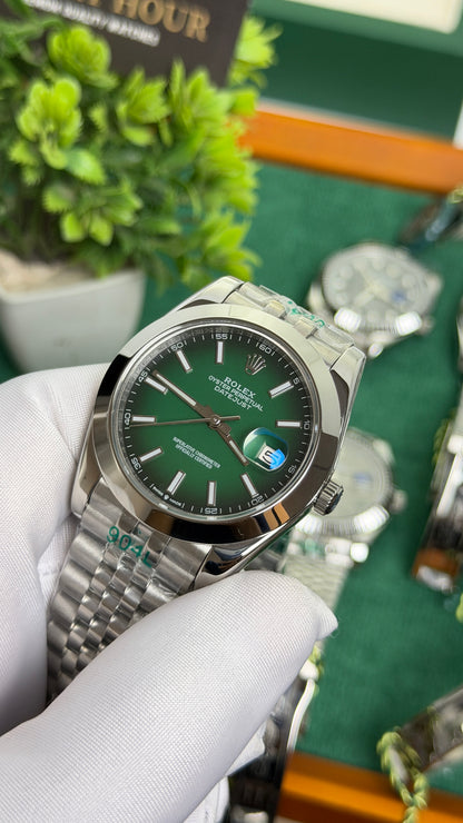 Silver with Green Dial.